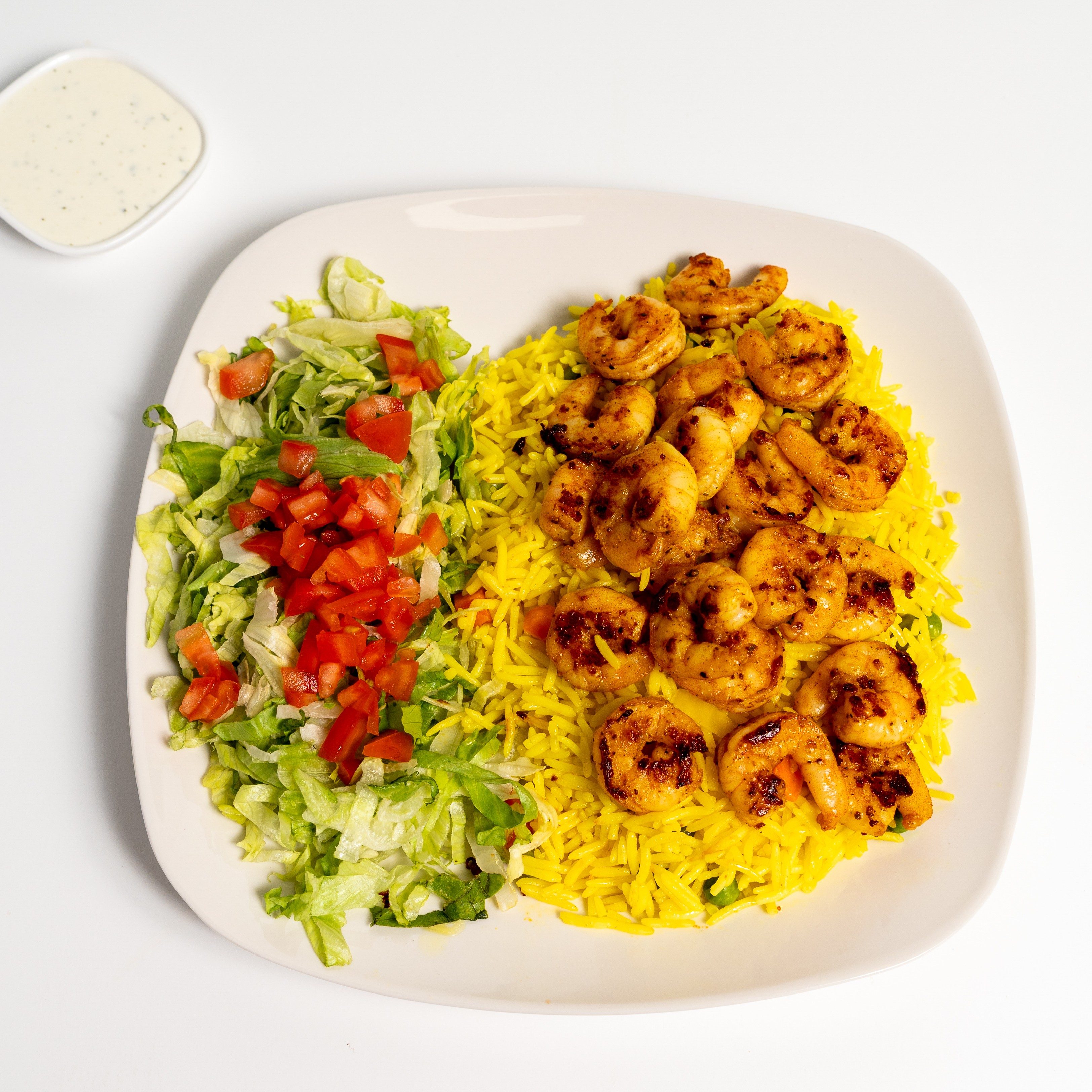 Shrimp over rice.