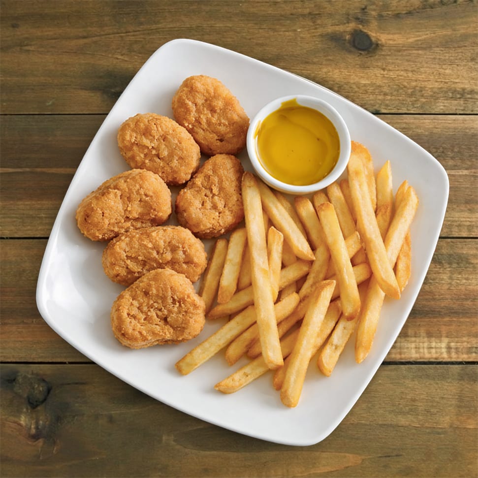 Kids nuggets with fries.